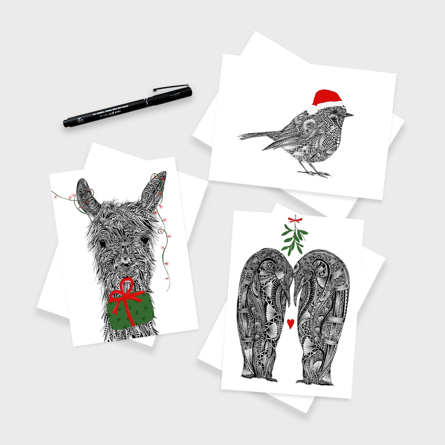 Whimsical animal Christmas greetings cards originally hand drawn in pen and ink by Pia Elliot in her Dorset studio