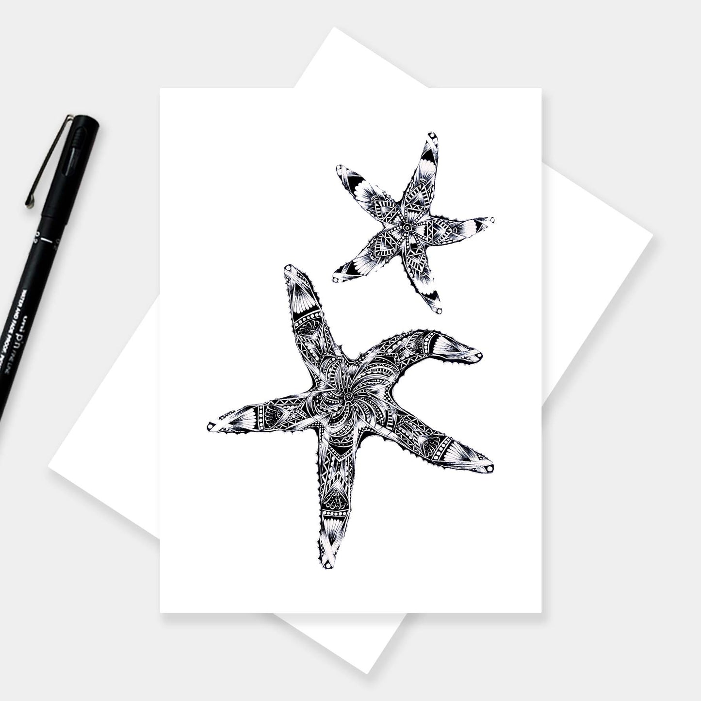 Monochrome blank starfish greetings card originally hand drawn in pen and ink by Pia Elliot in her Dorset studio