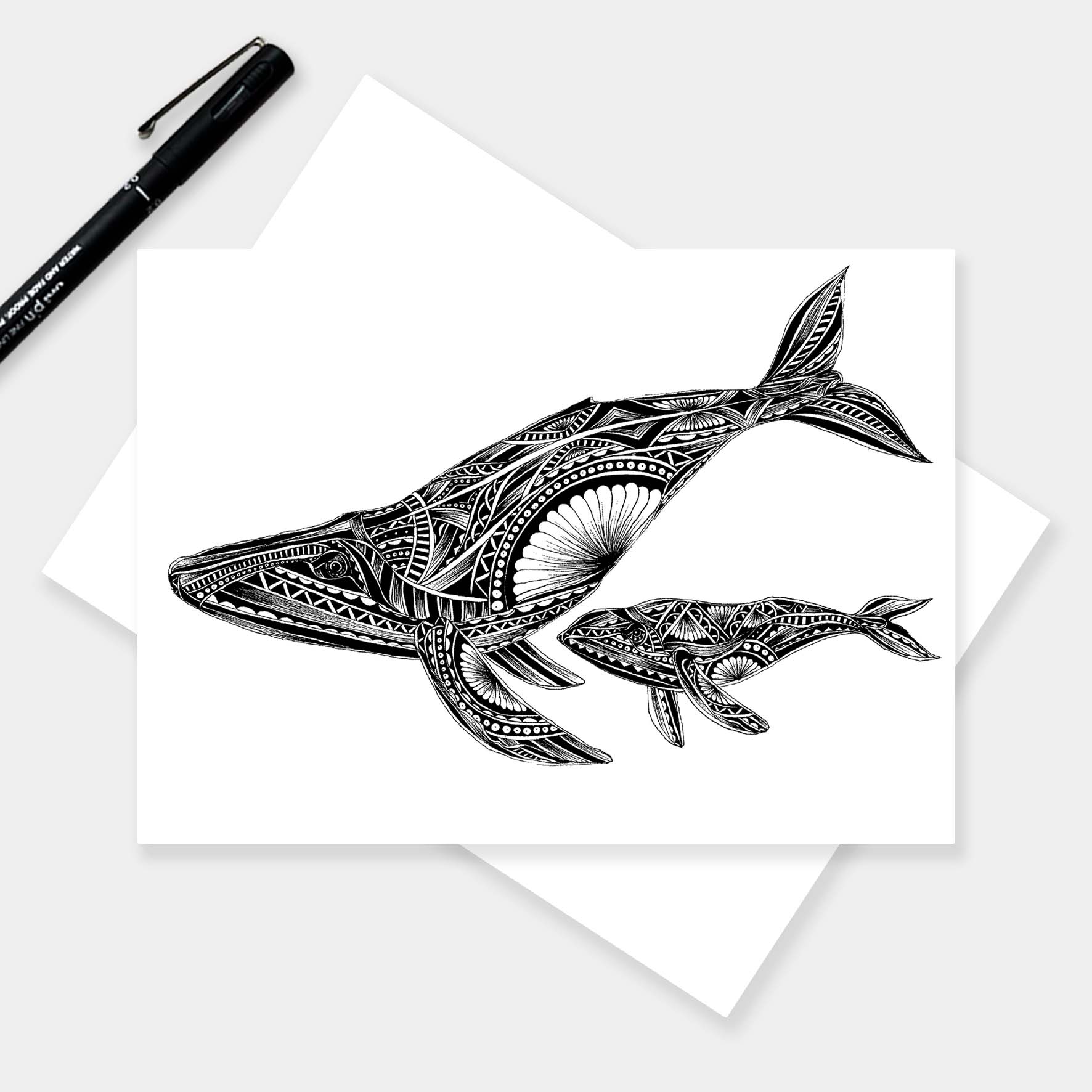 Monochrome blank whale and calf greetings card originally hand drawn in pen and ink by Pia Elliot in her Dorset studio