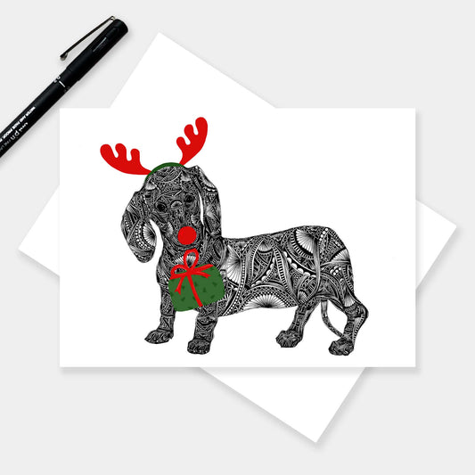 Whimsical dachshund Christmas greetings card originally hand drawn in pen and ink by Pia Elliot in her Dorset studio