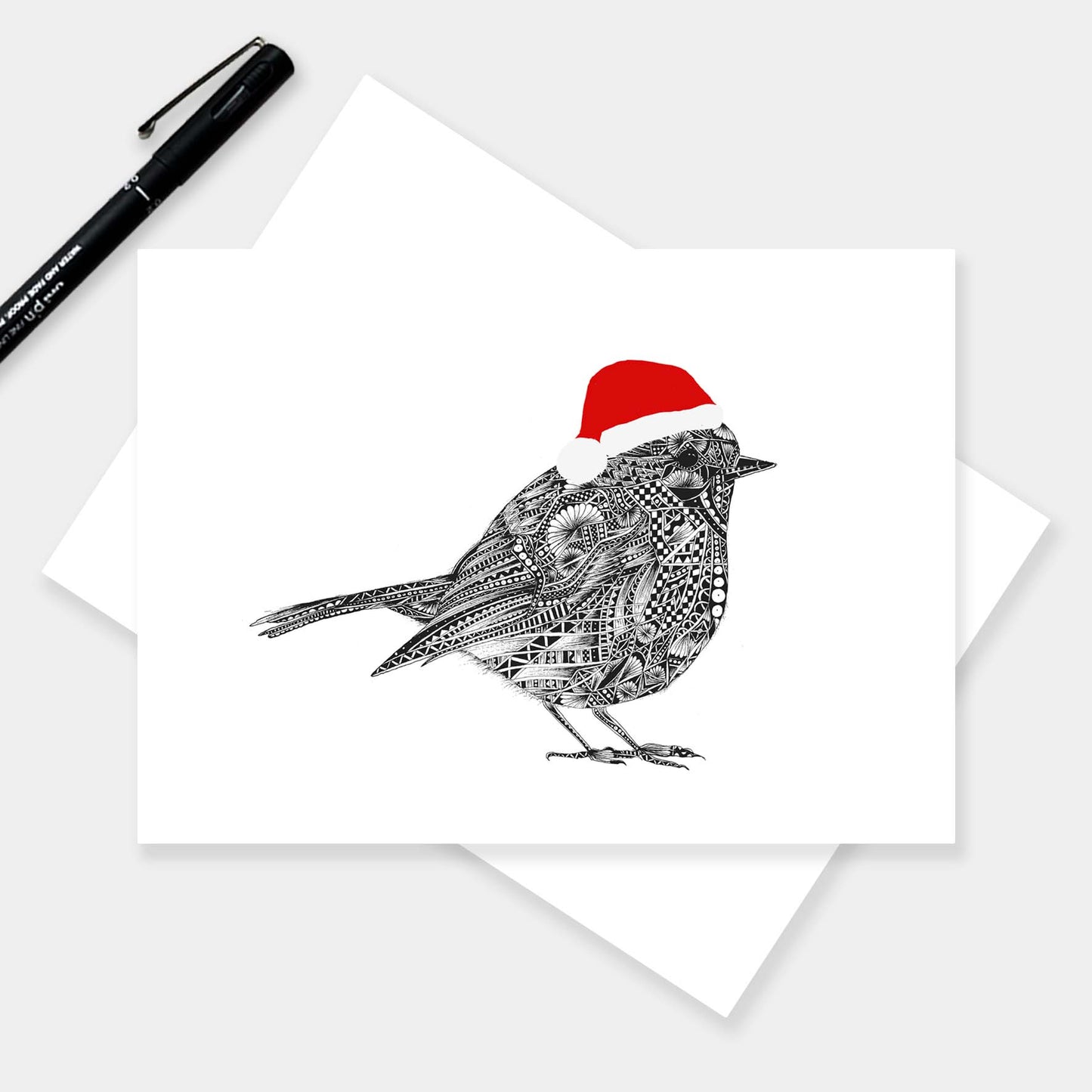 Robin Christmas greetings card originally hand drawn in pen and ink by Pia Elliot in her Dorset studio