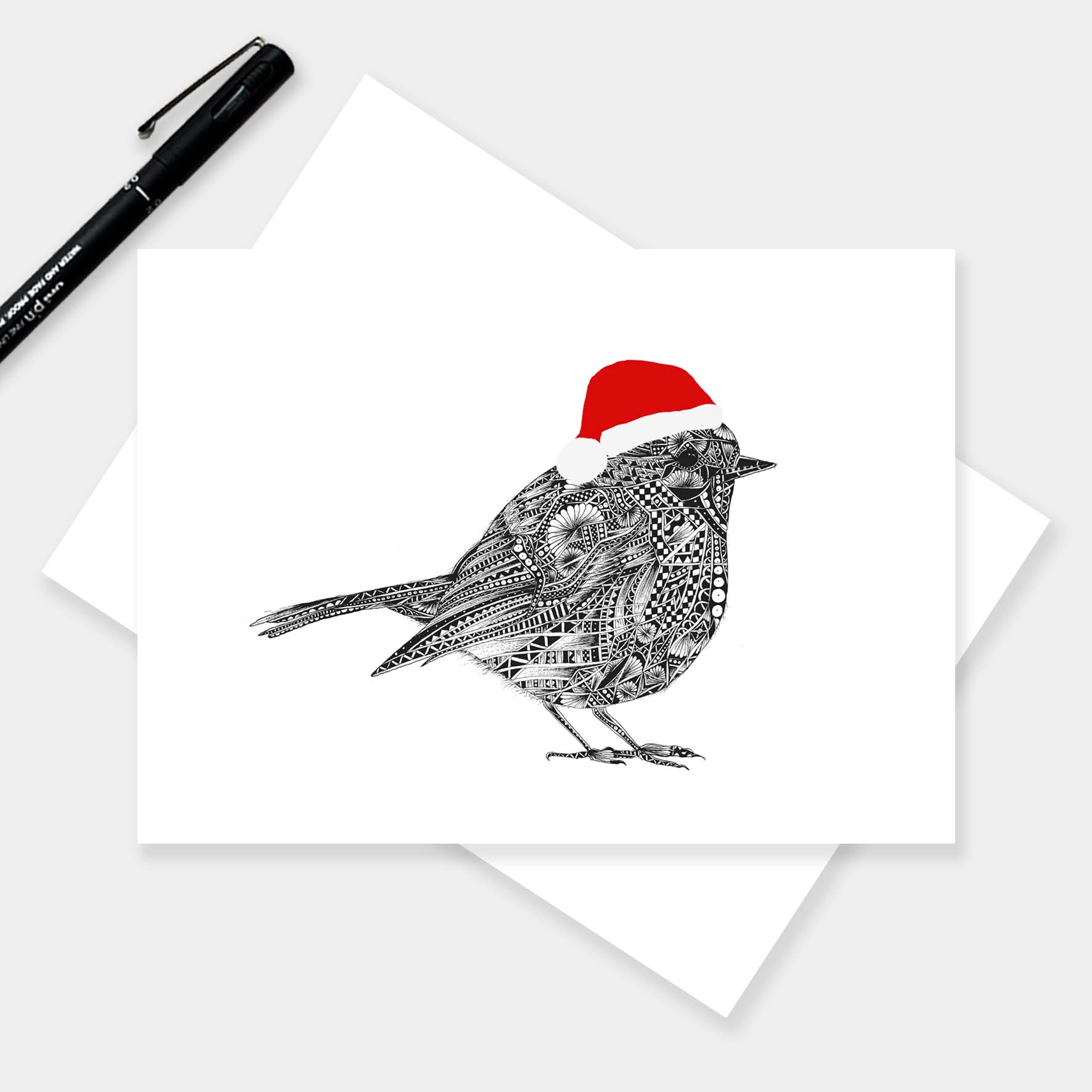 Robin Christmas greetings card originally hand drawn in pen and ink by Pia Elliot in her Dorset studio