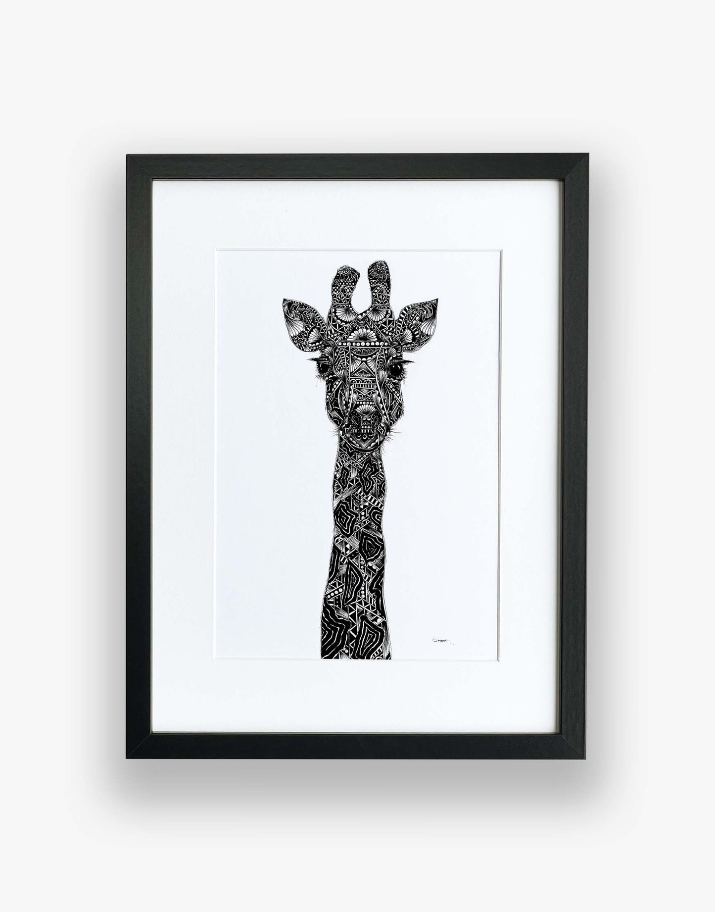 Monochrome, giraffe, limited edition artwork in black frame, hand drawn in pen and ink by Pia Elliot in her Dorset studio