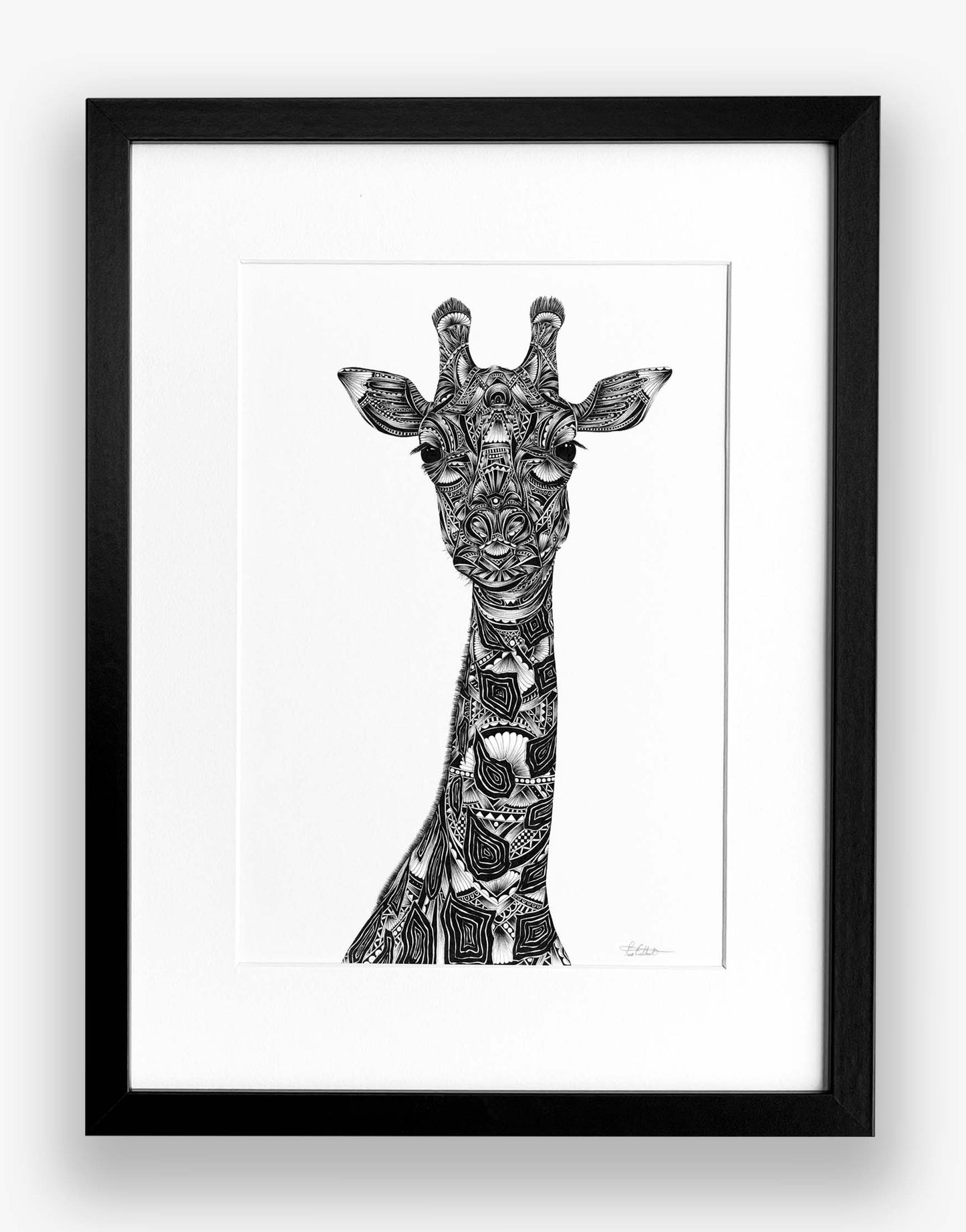 Framed black and white illustration of a giraffe on a white background