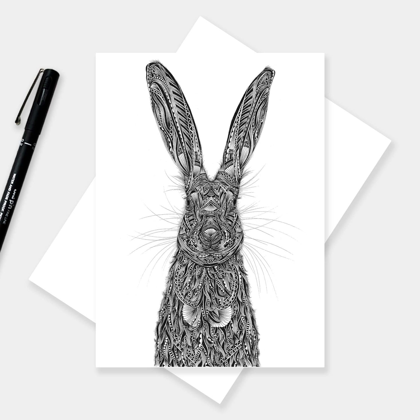 Monochrome blank hare greetings card originally hand drawn in pen and ink by Pia Elliot in her Dorset studio
