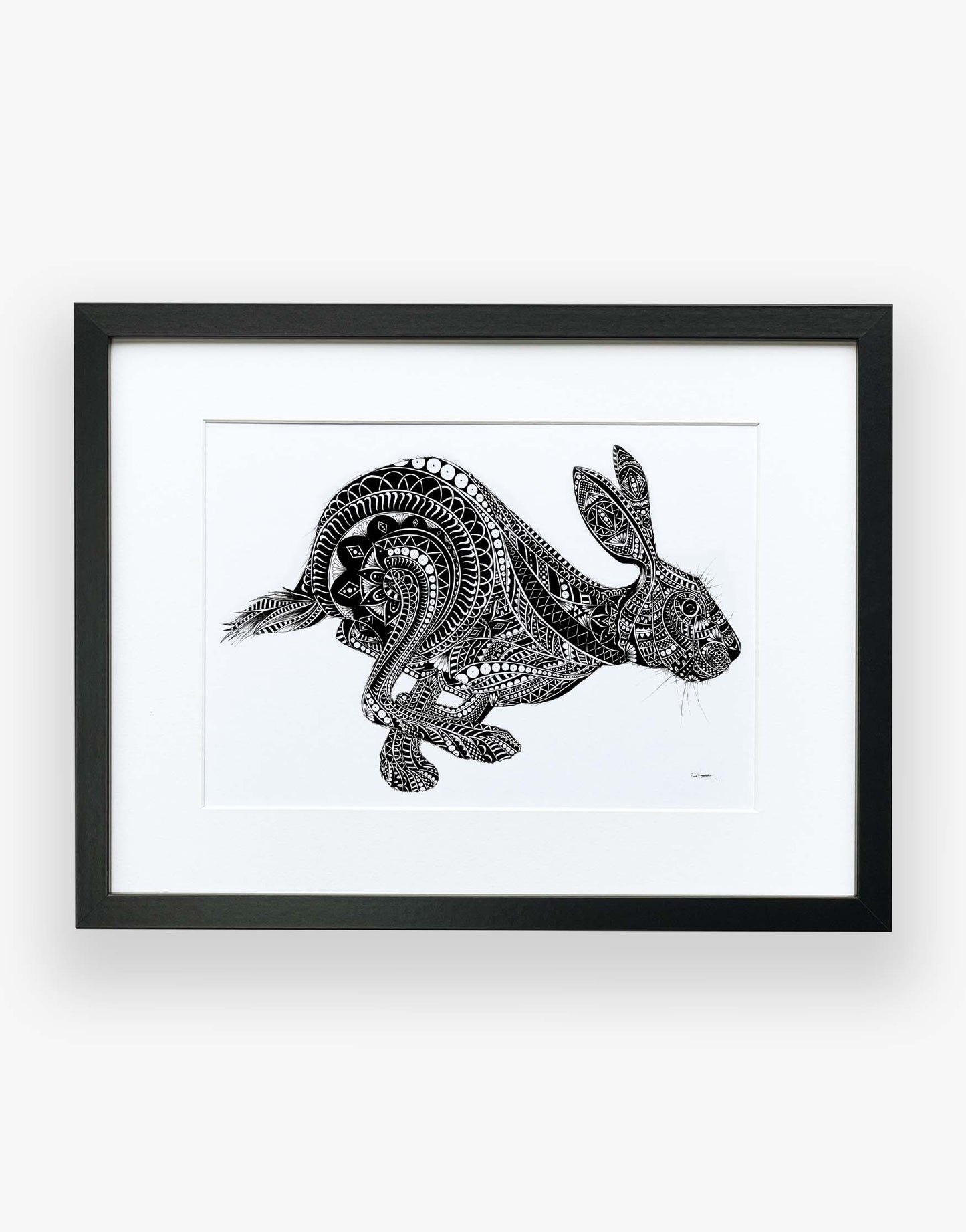 Monochrome, running hare, limited edition artwork, hand drawn in pen and ink by Pia Elliot in her Dorset studio