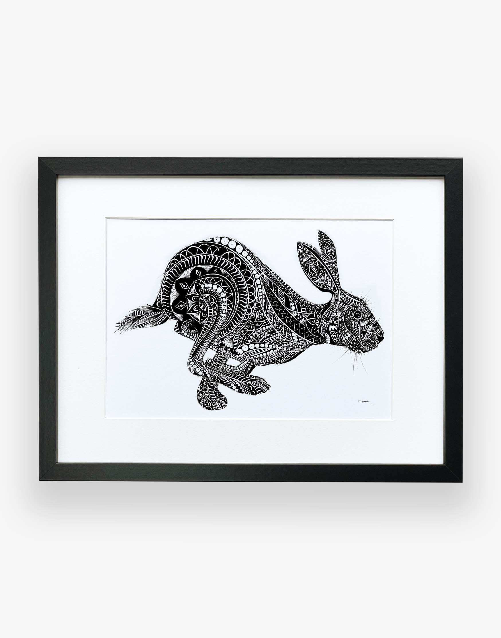 Monochrome, running hare, limited edition artwork, hand drawn in pen and ink by Pia Elliot in her Dorset studio