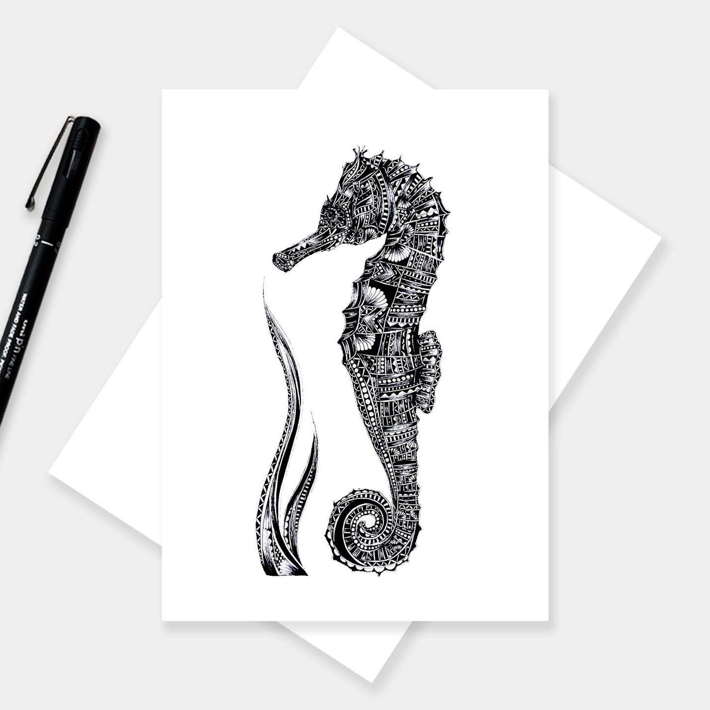 Monochrome blank seahorse greetings card originally hand drawn in pen and ink by Pia Elliot in her Dorset studio