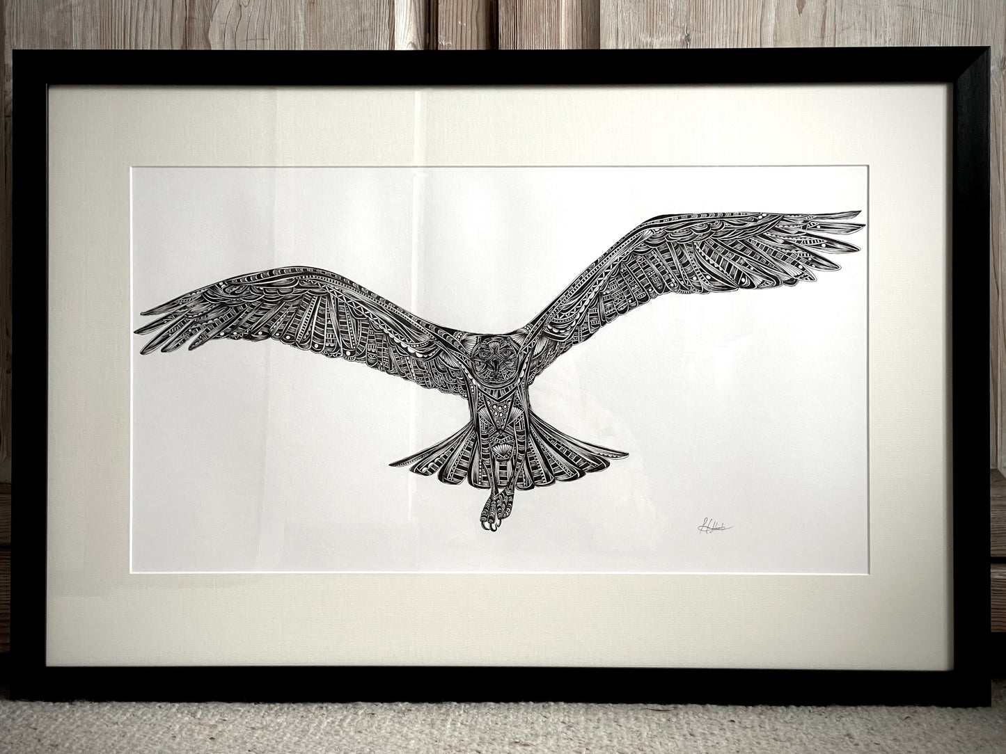 Monochrome osprey original artwork in black frame, hand drawn in pen and ink by Pia Elliot in her Dorset studio