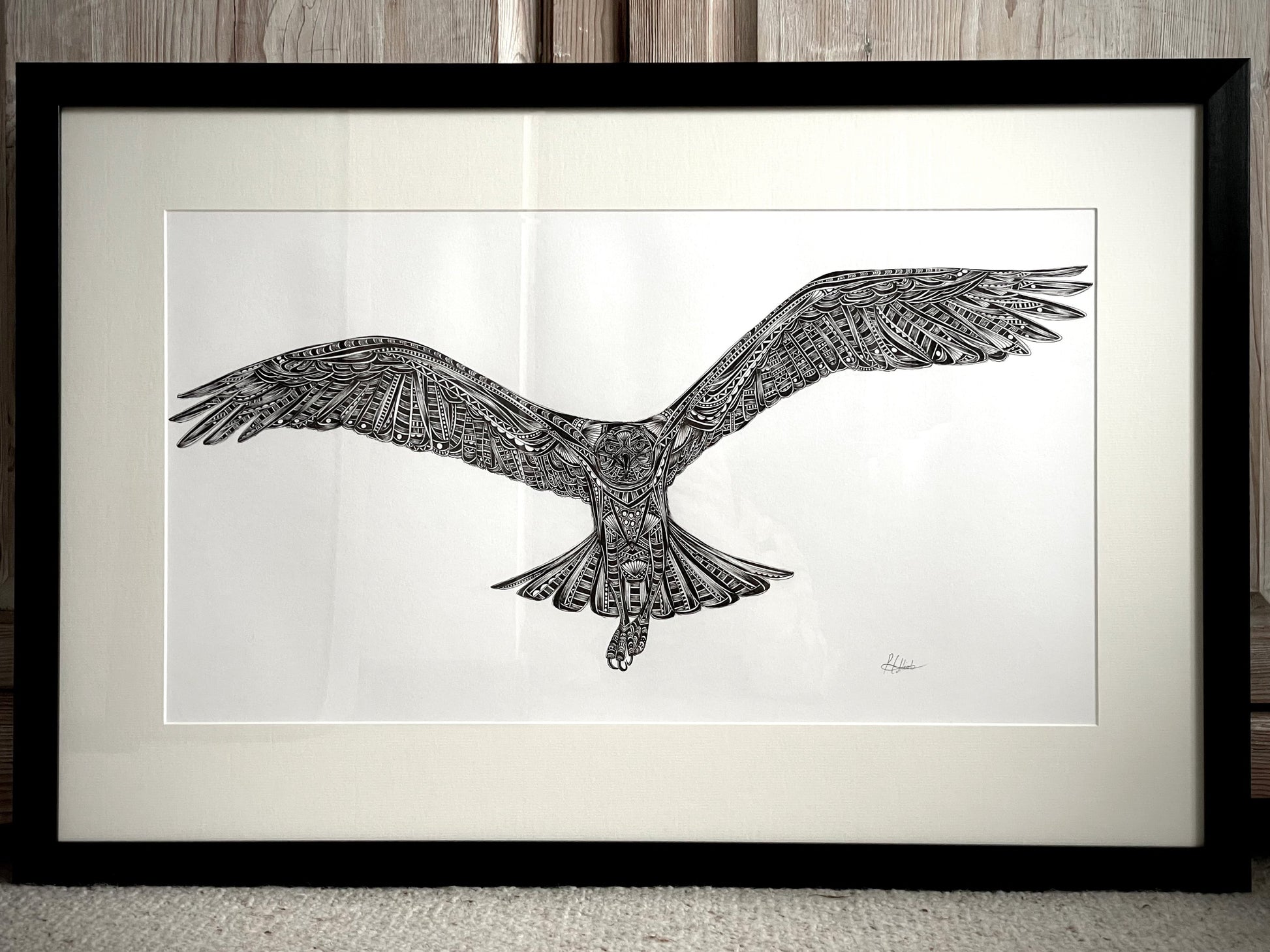 Monochrome osprey original artwork in black frame, hand drawn in pen and ink by Pia Elliot in her Dorset studio