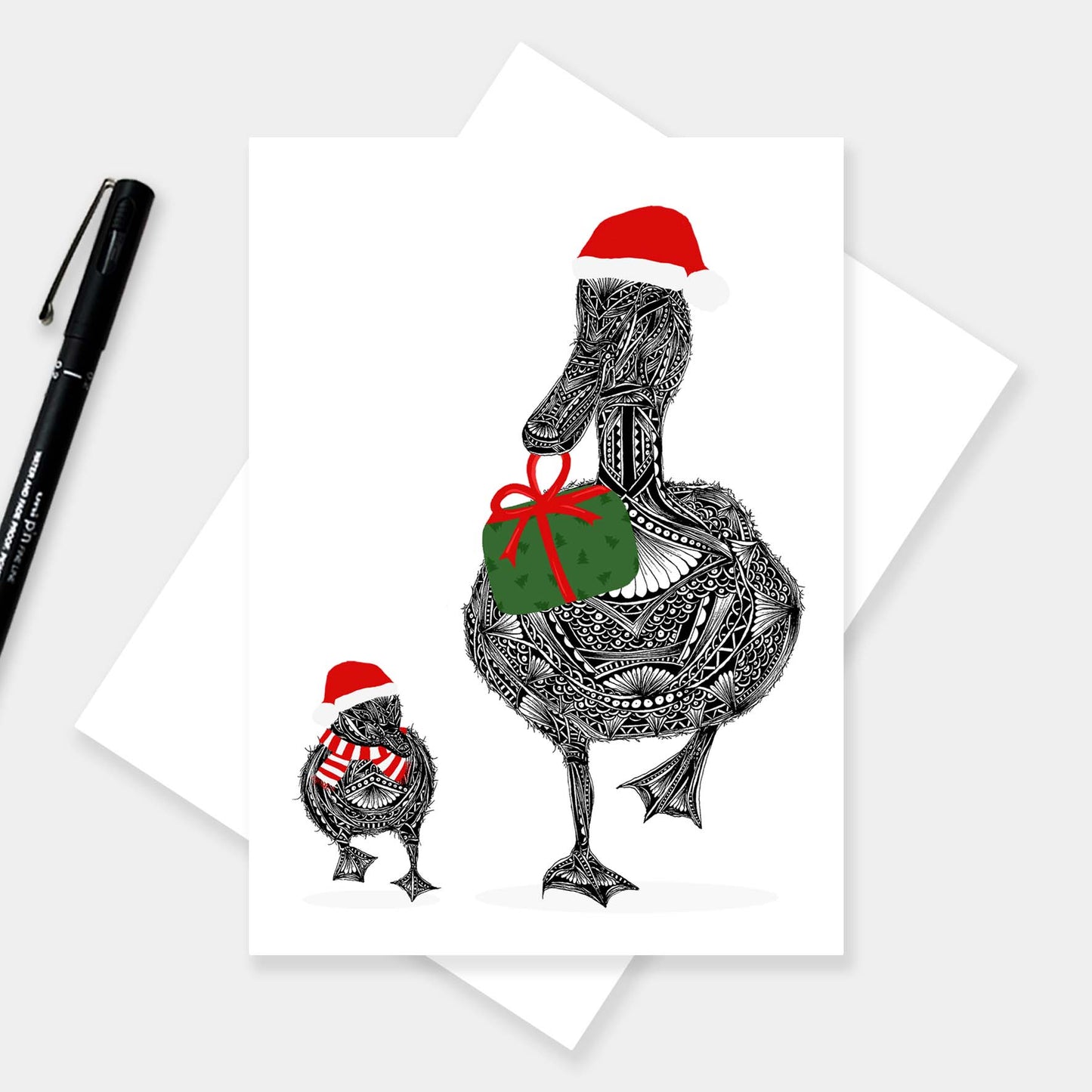 Whimsical duck Christmas greetings card originally hand drawn in pen and ink by Pia Elliot in her Dorset studio