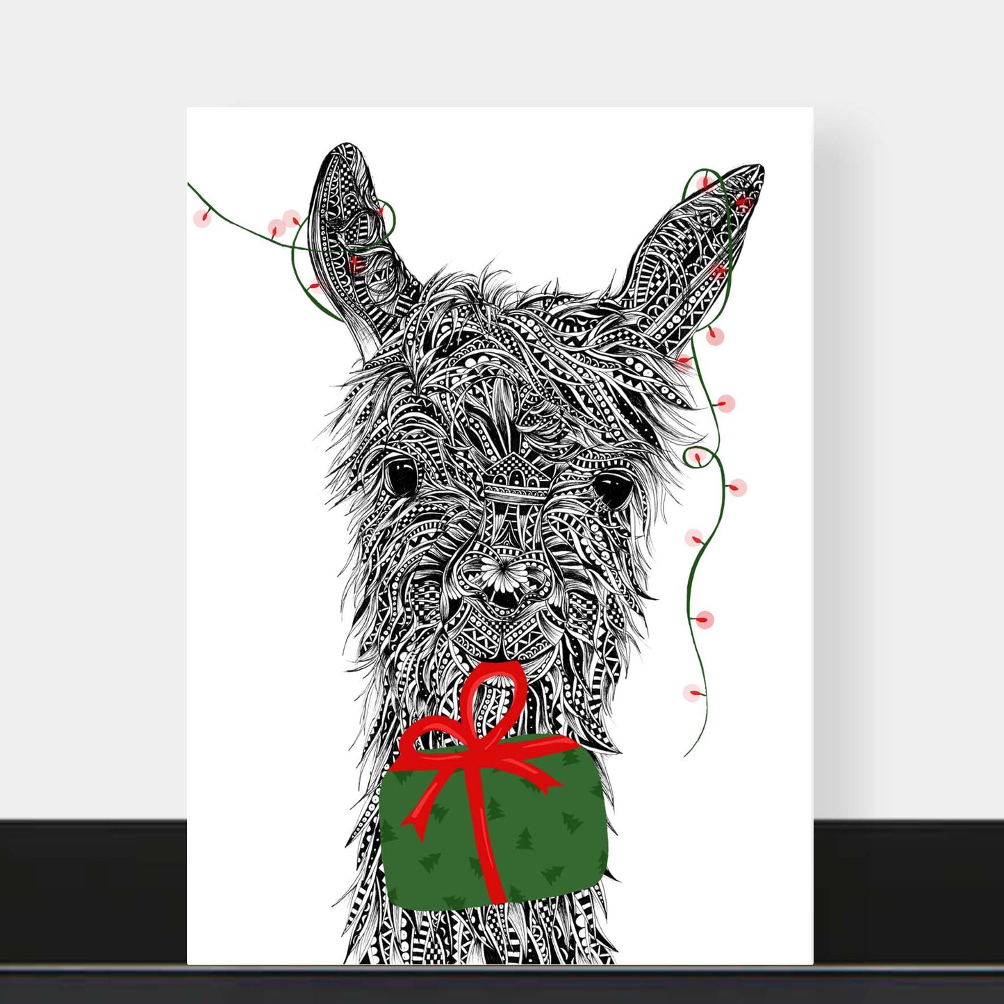 Whimsical llama Christmas greetings card originally hand drawn in pen and ink by Pia Elliot in her Dorset studio