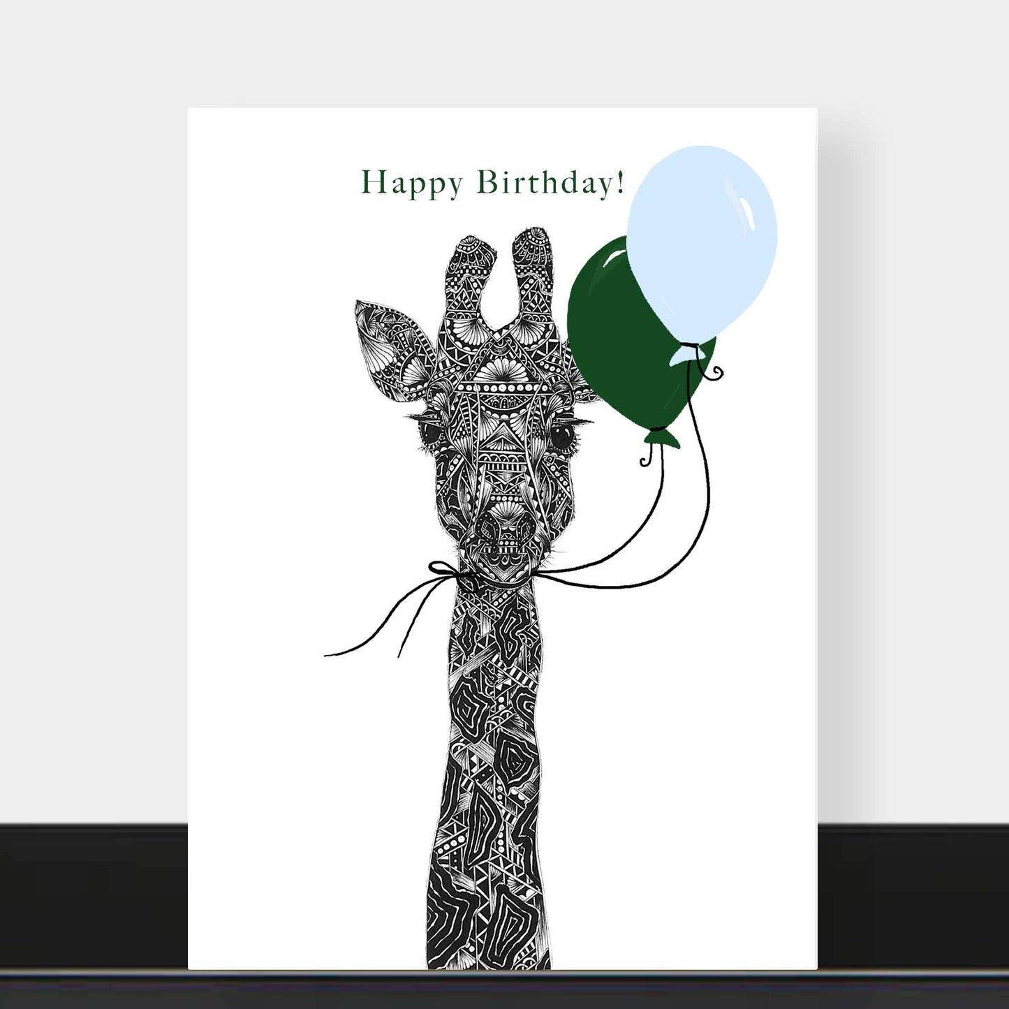 Whimsical giraffe birthday greetings card originally hand drawn in pen and ink by Pia Elliot in her Dorset studio