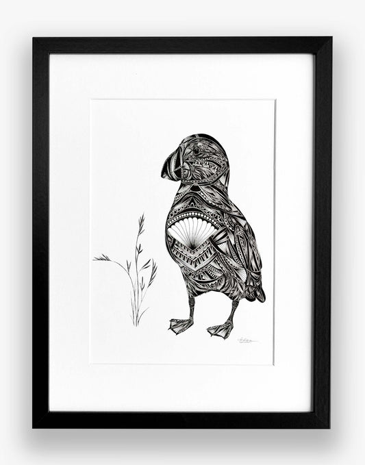 framed black and white artwork of a puffin on a white background