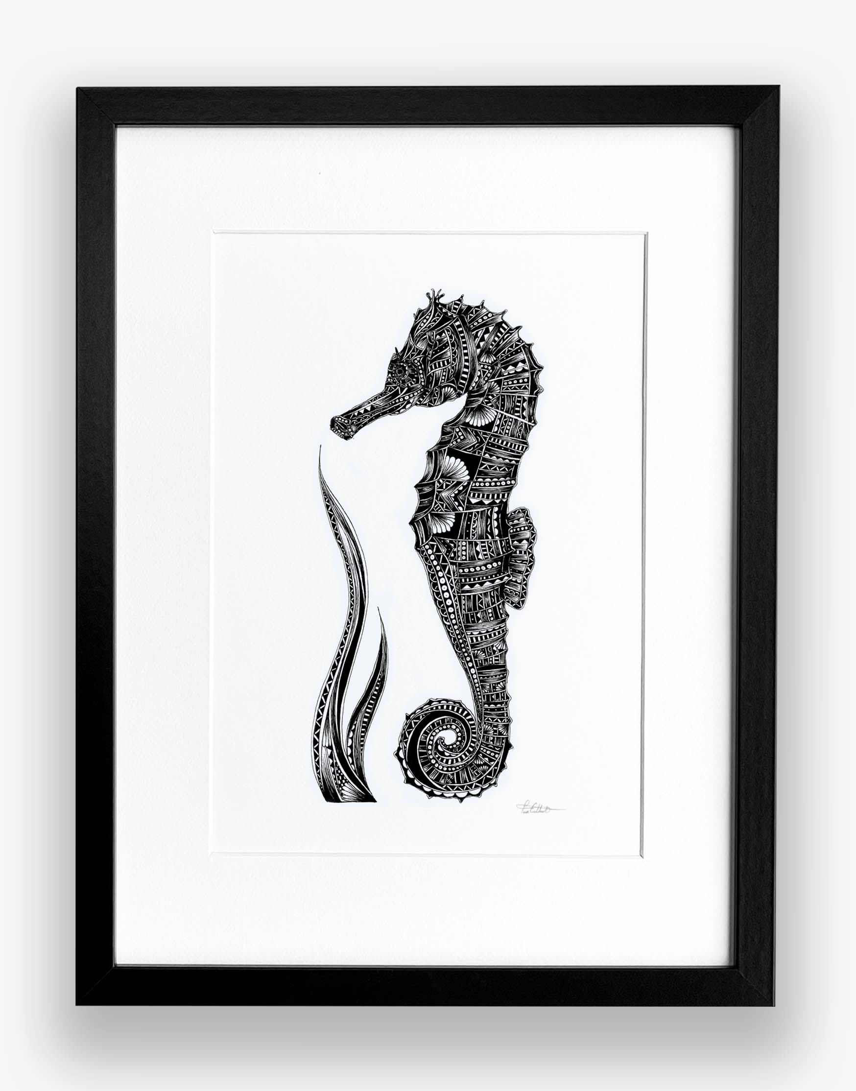 Framed black and white illustration of a seahorse on a white background