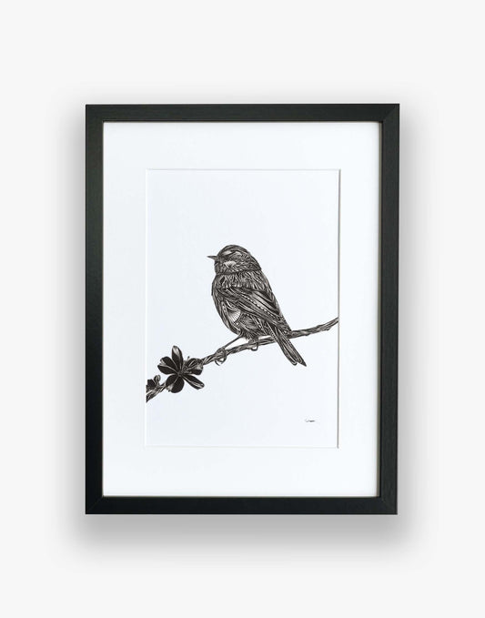 black and white patterned artwork of bird on branch with blossom flower