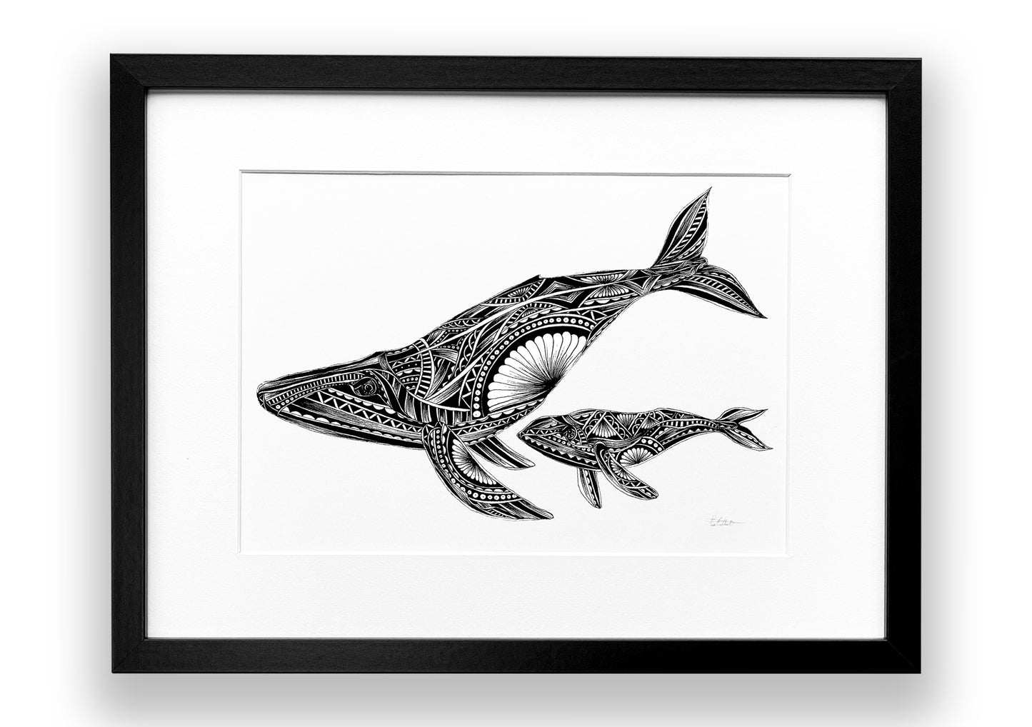 Framed black and white illustration of a whale and calf on a white background